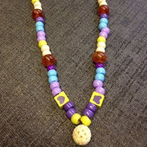 Ivory Coast Ball Pendant Necklace